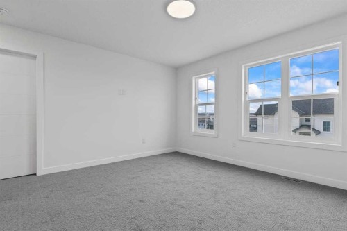 90 Heritage Circle, Cochrane, AB - Indoor Photo Showing Other Room