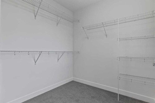 90 Heritage Circle, Cochrane, AB - Indoor With Storage