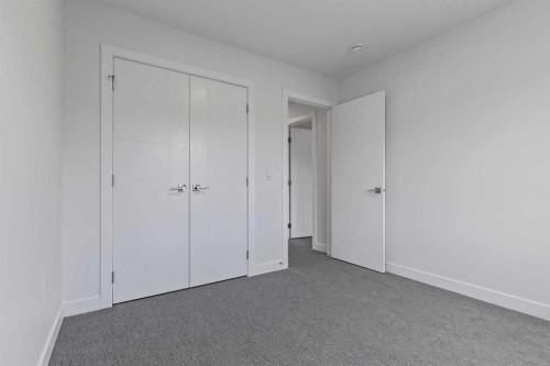 90 Heritage Circle, Cochrane, AB - Indoor Photo Showing Other Room