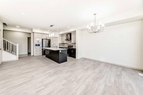 31 Lucas Passage Nw, Calgary, AB - Indoor Photo Showing Kitchen With Upgraded Kitchen
