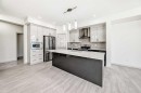31 Lucas Passage Nw, Calgary, AB  - Indoor Photo Showing Kitchen With Upgraded Kitchen 