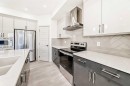 31 Lucas Passage Nw, Calgary, AB  - Indoor Photo Showing Kitchen With Upgraded Kitchen 
