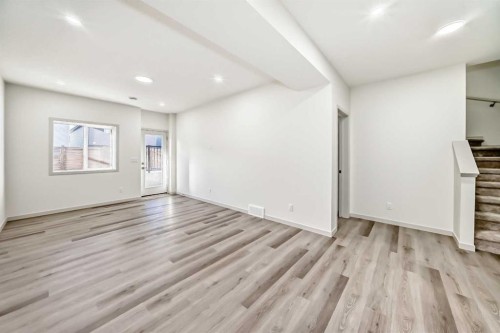31 Lucas Passage Nw, Calgary, AB - Indoor Photo Showing Other Room