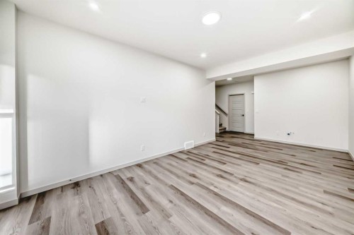 31 Lucas Passage Nw, Calgary, AB - Indoor Photo Showing Other Room