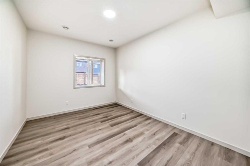 31 Lucas Passage Nw, Calgary, AB - Indoor Photo Showing Other Room