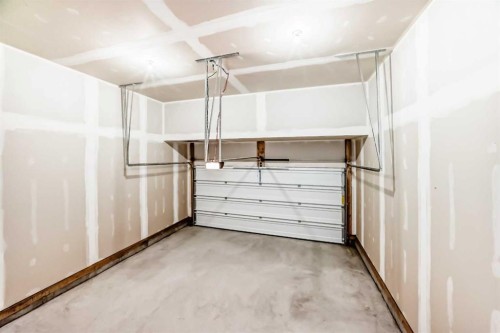 31 Lucas Passage Nw, Calgary, AB - Indoor Photo Showing Garage
