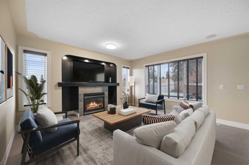 5619 Coach Hill Road Sw, Calgary, AB - Indoor Photo Showing Living Room With Fireplace