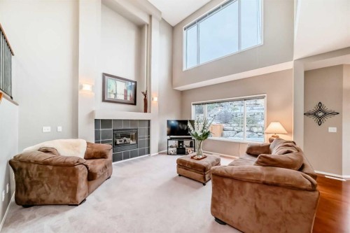 11931 Valley Ridge Drive Nw, Calgary, AB - Indoor Photo Showing Living Room With Fireplace