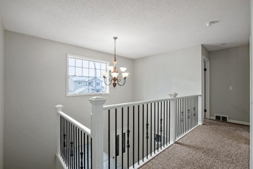 104 Cove Crescent, Chestermere, AB - Indoor Photo Showing Other Room