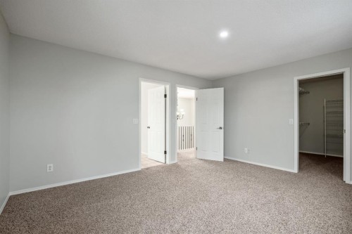 104 Cove Crescent, Chestermere, AB - Indoor Photo Showing Other Room