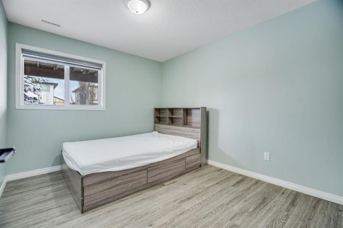 104 Cove Crescent, Chestermere, AB - Indoor Photo Showing Bedroom