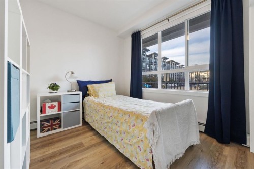 117-30 Walgrove Se, Calgary, AB - Indoor Photo Showing Bedroom