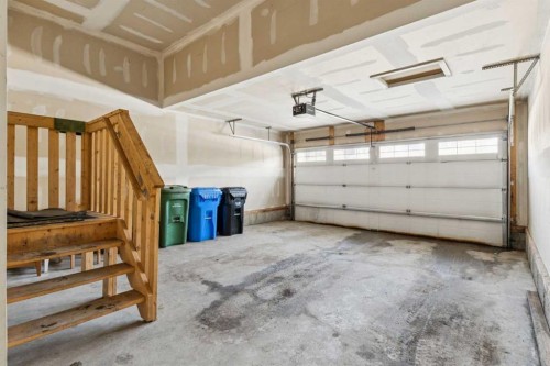 116 Walden Parade Se, Calgary, AB - Indoor Photo Showing Garage