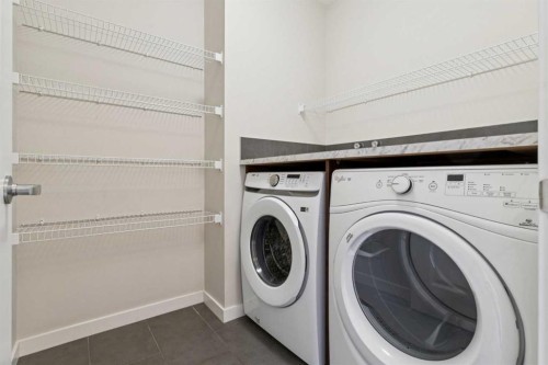 116 Walden Parade Se, Calgary, AB - Indoor Photo Showing Laundry Room