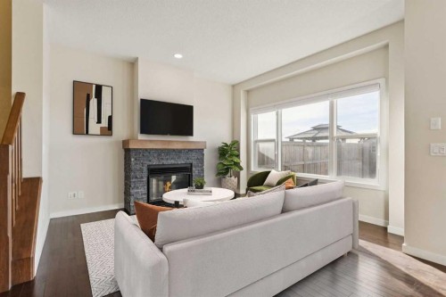 116 Walden Parade Se, Calgary, AB - Indoor Photo Showing Living Room With Fireplace