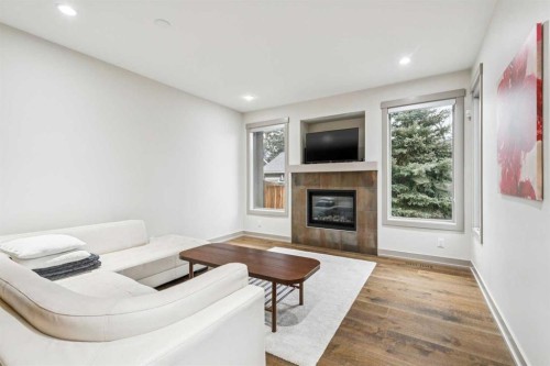 3922 19 Street Sw, Calgary, AB - Indoor Photo Showing Living Room With Fireplace