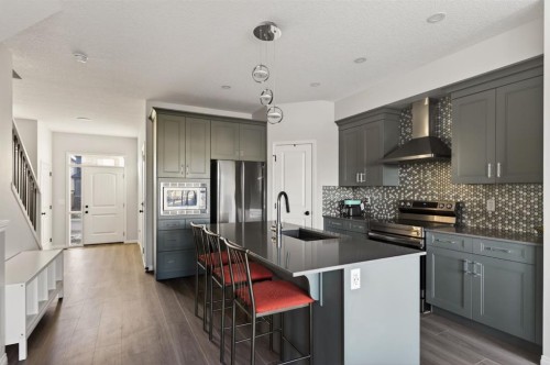 247 Belmont Heath Sw, Calgary, AB - Indoor Photo Showing Kitchen With Upgraded Kitchen
