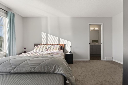 247 Belmont Heath Sw, Calgary, AB - Indoor Photo Showing Bedroom