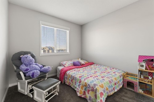 247 Belmont Heath Sw, Calgary, AB - Indoor Photo Showing Bedroom