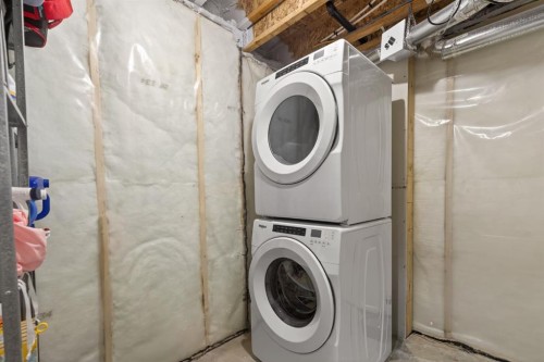 247 Belmont Heath Sw, Calgary, AB - Indoor Photo Showing Laundry Room