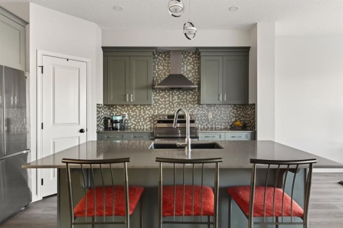 247 Belmont Heath Sw, Calgary, AB - Indoor Photo Showing Kitchen With Double Sink With Upgraded Kitchen