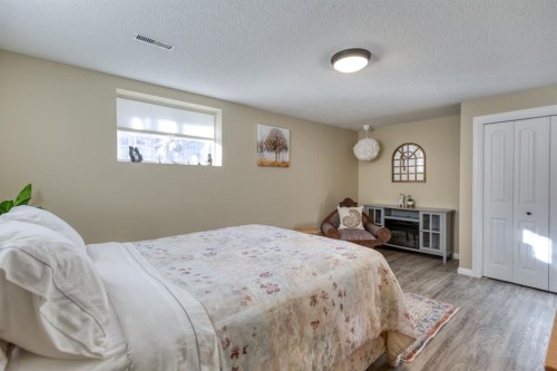 321 De Foras Close Nw, High River, AB - Indoor Photo Showing Bedroom