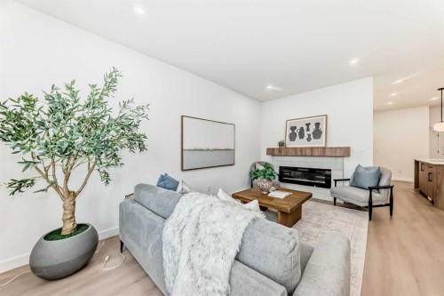 8530 Bowness Road Nw, Calgary, AB - Indoor Photo Showing Living Room With Fireplace
