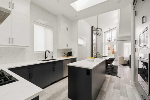 103 Haskayne Drive Nw, Calgary, AB - Indoor Photo Showing Kitchen With Upgraded Kitchen