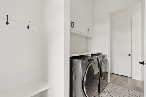103 Haskayne Drive Nw, Calgary, AB - Indoor Photo Showing Laundry Room