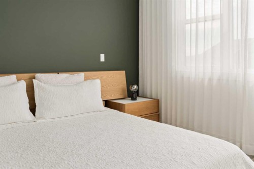 103 Haskayne Drive Nw, Calgary, AB - Indoor Photo Showing Bedroom