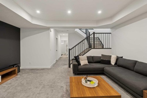 103 Haskayne Drive Nw, Calgary, AB - Indoor Photo Showing Living Room
