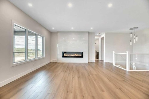 158 Speargrass Crescent, Carseland, AB - Indoor Photo Showing Living Room With Fireplace