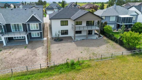 158 Speargrass Crescent, Carseland, AB - Outdoor With Deck Patio Veranda With Facade