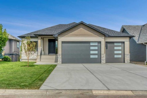 158 Speargrass Crescent, Carseland, AB - Outdoor With Facade