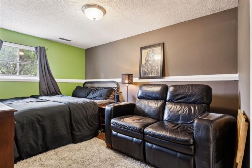 147 Falchurch Crescent Ne, Calgary, AB - Indoor Photo Showing Bedroom