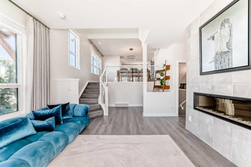 38 Lavender Road Se, Calgary, AB - Indoor Photo Showing Living Room With Fireplace