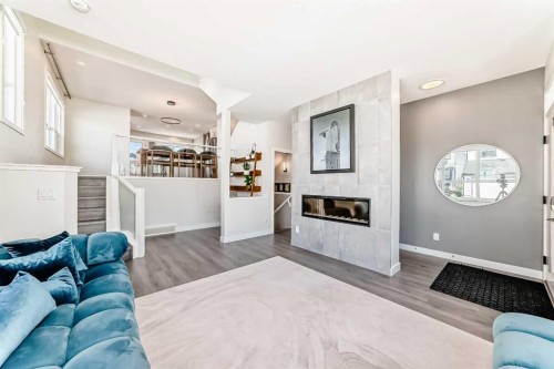 38 Lavender Road Se, Calgary, AB - Indoor Photo Showing Living Room With Fireplace