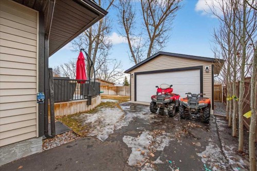 102 Hodson Crescent, Okotoks, AB - Outdoor With Deck Patio Veranda With Exterior