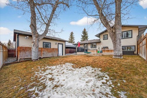 102 Hodson Crescent, Okotoks, AB - Outdoor With Deck Patio Veranda