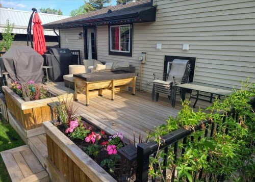 102 Hodson Crescent, Okotoks, AB - Outdoor With Deck Patio Veranda With Exterior