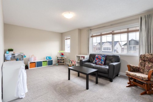 128 Seagreen Manor, Chestermere, AB - Indoor Photo Showing Living Room