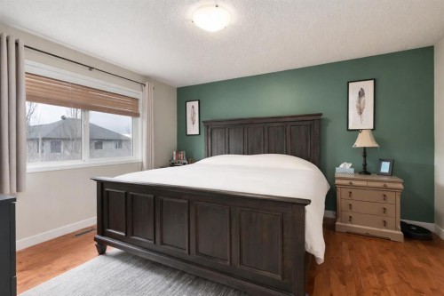 128 Seagreen Manor, Chestermere, AB - Indoor Photo Showing Bedroom
