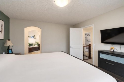128 Seagreen Manor, Chestermere, AB - Indoor Photo Showing Bedroom