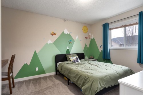 128 Seagreen Manor, Chestermere, AB - Indoor Photo Showing Bedroom