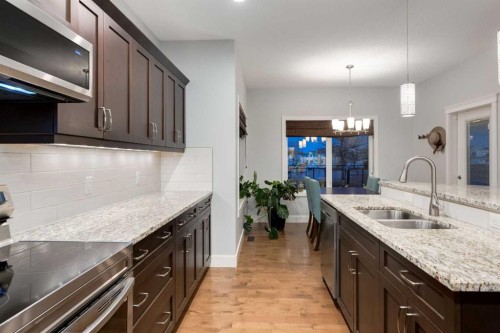 2050 High Country Rise, High River, AB - Indoor Photo Showing Kitchen With Double Sink With Upgraded Kitchen