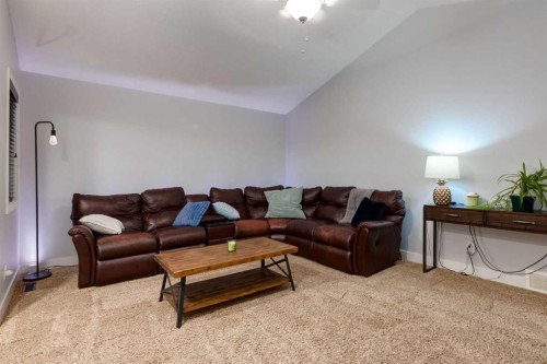 2050 High Country Rise, High River, AB - Indoor Photo Showing Living Room