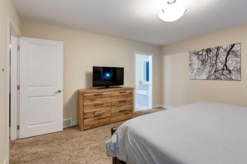 2050 High Country Rise, High River, AB - Indoor Photo Showing Bedroom