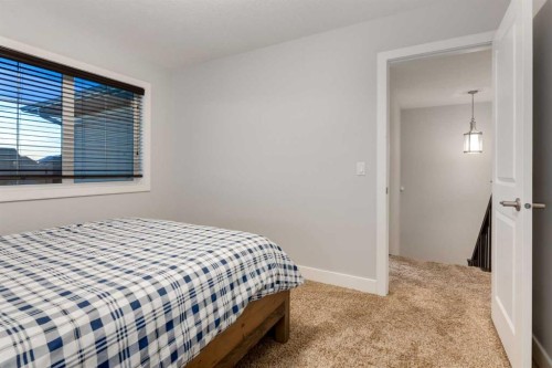 2050 High Country Rise, High River, AB - Indoor Photo Showing Bedroom