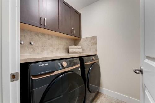 2050 High Country Rise, High River, AB - Indoor Photo Showing Laundry Room