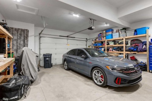 2050 High Country Rise, High River, AB - Indoor Photo Showing Garage